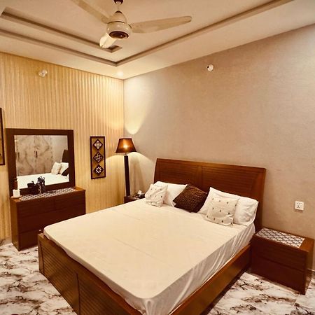 Comfy Cottage Faisalabad Exterior foto